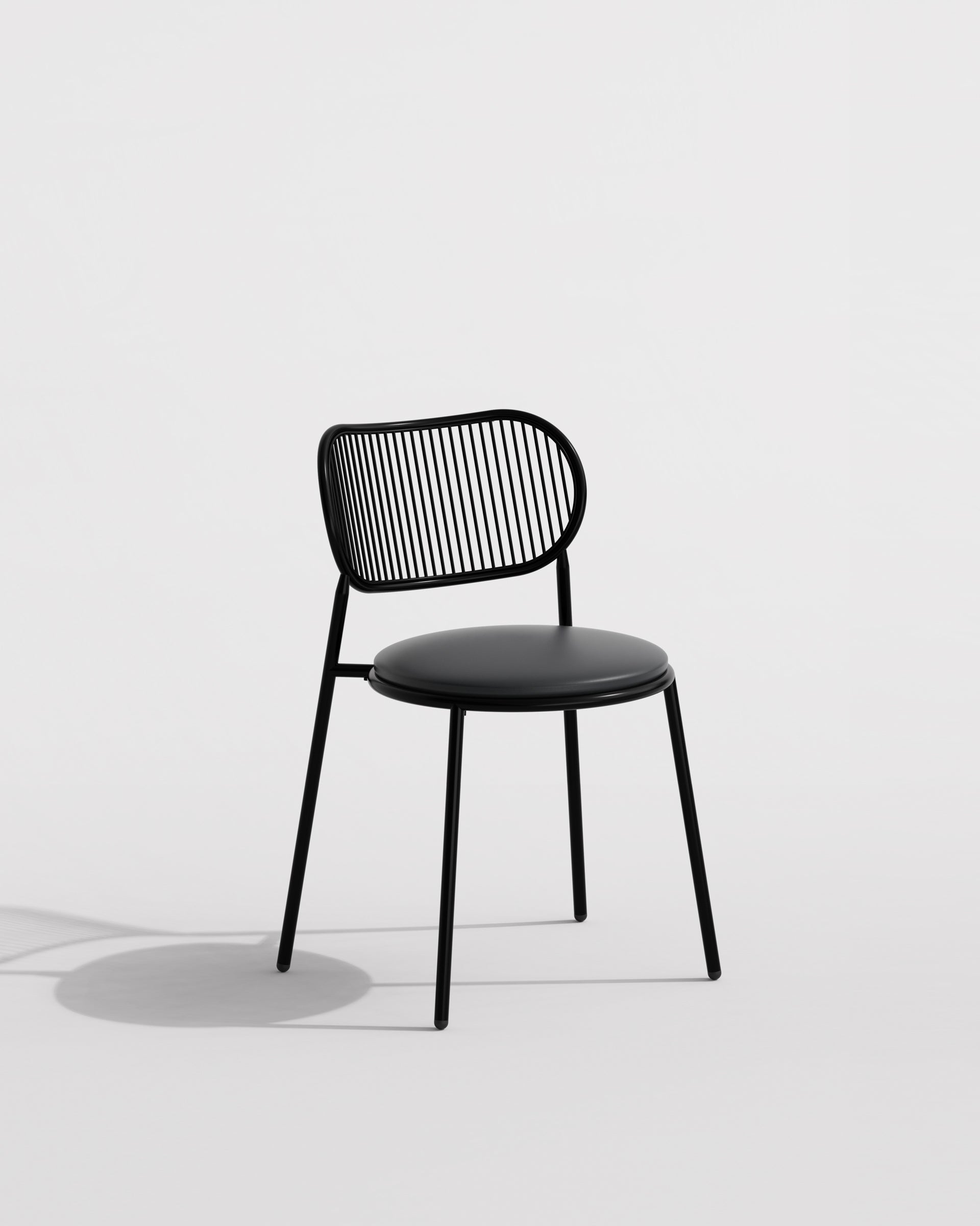 Piper Dining Chair Upholstered | Fabric or Leather Seat Stackable | Designed by GibsonKarlo | DesignByThem | ** Maharam Lariat (Vinyl) 006 Black